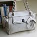 Jessica Simpson Bags | Jessica Simpson Logan White Bow Crossbody Bag | Color: White | Size: 13" X 5.5"