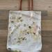 Anthropologie Bags | Anthropologie Fleur Perforated Leather Tote | Color: White | Size: 17” By 15”