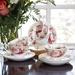 Grace's Tea Ware Peony Strawberry Cream Bone China Tea Cup & Saucer, Set Of 4 Bone China/Ceramic in Pink/Red | 2.25 H x 5.25 W in | Wayfair