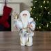 Northlight Seasonal 12" White & Gold Standing Santa Carrying A Full Sac Of Presents Christmas Figure | 12 H x 7 W x 5 D in | Wayfair