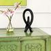 Ivy Bronx Jeffords Natural Soapstone Lovers Knot Sculpture Stone in Black | 6 H x 2.5 W x 2 D in | Wayfair 797AD2D14C024D99BDF28596C494D3D5