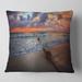 Designart 'Reddish Sunset over Clear Beach' Seashore Throw Pillow