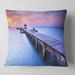 Designart 'Purple Seas and Long Wooden Pier' Pier Seascape Throw Pillow