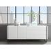 IL VETRO buffet-server in high gloss white lacquer with clear glass.