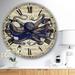 Designart 'Octopus Music Score I' Oversized Nautical & Coastal Wall Clock