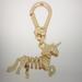 Coach Accessories | Coach - Collectible Unicorn Skeletal Charm (Nwt) | Color: Gold | Size: Os