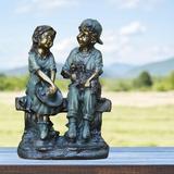 Astoria Grand Yadiel Girl and Boy Sitting on Bench w/ Puppy Statue Resin/Plastic/Stone in Black/Blue/Gray | 16 H x 11 W x 7 D in | Wayfair