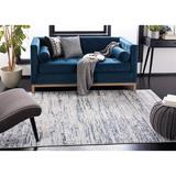 Blue/White 0.43 in Indoor Area Rug - Highland Dunes Granada Abstract Ivory/Blue Area Rug Polypropylene | 0.43 D in | Wayfair