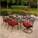 Hanover Traditions 7-Piece Dining Set in Red with Two Swivel Rockers, Four Dining Chairs, and a 72 x 38 in. Cast-top Table