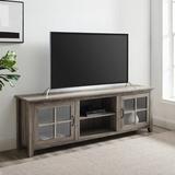 Charlton Home® Dake TV Stand for TVs up to 78" Wood/Glass in Brown | 24 H in | Wayfair 743B4D81B9BB4C5DB15BBB9314072793