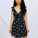 American Eagle Outfitters Dresses | Black Small Floral Print Ruffle Mini Wrap Dress Os | Color: Black/Pink | Size: One Size