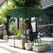 Freeport Park® Evanoff 9' Market Easy Crank Outdoor Patio Umbrella w/ Auto Tilt, Steel in Green | 94.44 H in | Wayfair