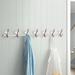 Beachcrest Home™ Cashel Metal 7 - Hook Wall Mounted Coat Rack Metal in Gray | 4.75 H x 40 W x 3.5 D in | Wayfair 77EDFCE290F14A32A9BAA18019D4651A