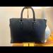 Louis Vuitton Bags | Anton Soft Briefcase Taiga Leather | Color: Black | Size: Os