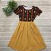 Lularoe Dresses | Lularoe Amelia Dress Tribal And Mustard Dress | Color: Gold/Yellow | Size: M