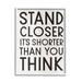 Ebern Designs 'Stand Closer Funny Bathroom Wood Texture Word Design' - Textual Art Print on Canvas Wood in Brown | 14 H x 11 W x 1.5 D in | Wayfair