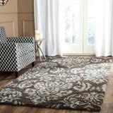 Brown 60 x 1.2 in Area Rug - Charlton Home® Schoch Floral Dark Area Rug Polypropylene | 60 W x 1.2 D in | Wayfair 6BB5685C5F2048719310B9977D477BE5