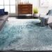 Blue/Gray 61 x 0.35 in Indoor Area Rug - Trent Austin Design® Mclawhorn Abstract Teal Area Rug Polypropylene | 61 W x 0.35 D in | Wayfair