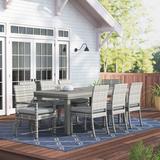 Wade Logan® Castelli Rectangular 8 - Person 83" Long Outdoor Dining Set w/ Cushions Glass/Metal | Wayfair 7C27A1DA5943413A9D9E2D5F482C15EF