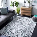 Blue/Green 110 x 79 x 0.31 in Indoor Area Rug - Mercer41 Ameyah Animal Print Ivory/Teal Area Rug | 110 H x 79 W x 0.31 D in | Wayfair