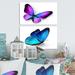 East Urban Home Violet & Blue Butterfly - 2 Piece Wrapped Canvas Painting Set Canvas in Blue/Indigo | 24 H x 20 W x 1 D in | Wayfair