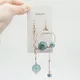 Boucles d'oreilles à bulles vertes pour femmes Design Original longues pendantes boule de verre