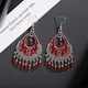 Boucles d'oreilles pendantes sculptées en argent avec pompon perles rouges vintage bijoux de