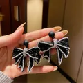 FYUAN-Boucles d'oreilles pendantes nœud papillon noir de style coréen pour femmes boucles