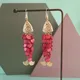 Boucles d'oreilles longues rondes en écaille de poisson rouge boucles d'oreilles pendantes