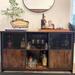 Steelside™ Mera 44" Wine Bar Cabinet w/ Glass Holder w/ Barn Door for Dining Room Living Room Wood/Metal in Brown | Wayfair