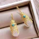 Boucles d'oreilles pendantes turquoise incrustées d'argent pour femmes jade naturel Hotan style