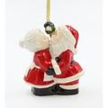 The Holiday Aisle® Santa & Mrs. Claus Kissing Ornament Ceramic/Porcelain in Red | 3.5 H x 1.75 W x 3 D in | Wayfair