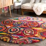 63 x 1.97 in Area Rug - Latitude Run® Verduzco Bohemian Circles Pink/Yellow/Multi Shag Rug Polypropylene | 63 W x 1.97 D in | Wayfair