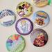 Disney Accessories | Disneyland Button Pins - Set Of 7 | Color: White/Silver | Size: Osbb