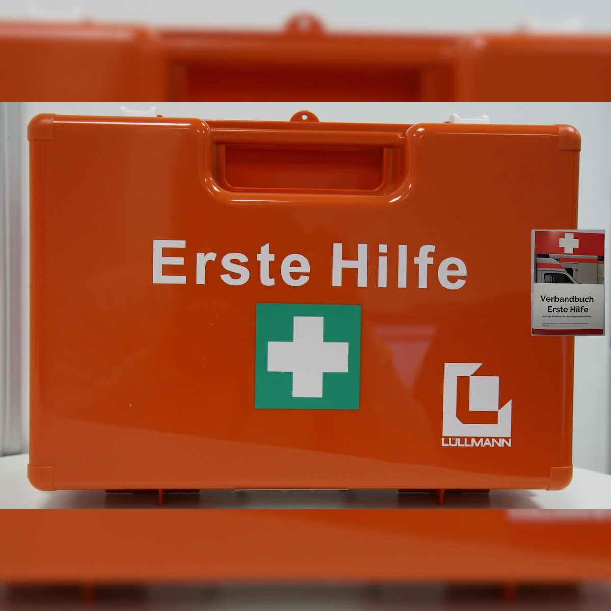 Lüllmann Erste-Hilfe-Koffer S + DIN-Füllung 13157 + Wandhalterung, inkl. 1x Verbandbuch Image