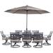 Hanover Montclair 9-Piece Dining Set in Tan with 8 Swivel Rockers, 42-In. x 84-In. Table, 11 Ft. Umbrella and Umbrella Stand