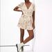 American Eagle Outfitters Dresses | Floral Wrap Front Romper | Color: Cream | Size: Xs