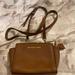 Michael Kors Bags | Michael Kors Brown Leather With Gold Hardware Cross Body Bag | Color: Brown | Size: Os