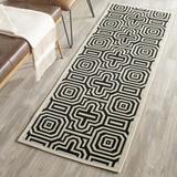 Black 27 x 0.25 in Area Rug - Wade Logan® Arneshia Geometric Sand/Indoor/Outdoor Area Rug | 27 W x 0.25 D in | Wayfair VKGL8482 37245051