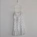 Jessica Simpson Dresses | Jessica Simpson White Polka Dot Ruffle Mini Dress Xs | Color: White | Size: Xs