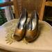 Jessica Simpson Shoes | Jessica Simpson Euc Peep Toe Heels Size 8b | Color: Black/Gold | Size: 8