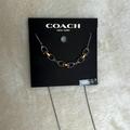 Coach Jewelry | Coach Silver Gold Signature Necklace | Color: Gold/Silver | Size: Os