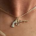 Urban Outfitters Jewelry | Country Gold Retro Chic Gun Pendant Neckla | Color: Gold/Pink | Size: Os