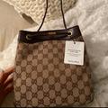 Gucci Bags | Gucci Bucket Bag Purse Crossbody | Color: Brown/Tan | Size: One Size