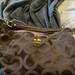 Coach Bags | Coach Purse. Good Condition. Has Coach Logo On It With Lilac Interior Inside. | Color: Black/Brown | Size: Os