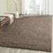 Brown 48 x 2 in Indoor Area Rug - Ebern Designs Rizco Handmade Shag Taupe Area Rug | 48 W x 2 D in | Wayfair 7B37AAC41C104025836CF869CF7CF5AC