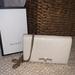 Gucci Bags | Gucci Guccissima Bow Chain Wallet | Color: Cream | Size: Os