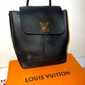 Louis Vuitton Bags | Louis Vuitton Calfskin Lockme Backpack | Color: Black/Silver | Size: Base Length: 8.25 In Height: 10.75 In Width: 5 In