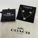 Coach Jewelry | Brand New Coach Open Circle Necklace And Tea Rose Studs | Color: Black | Size: Os
