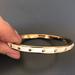 Kate Spade Jewelry | Kate Spade White And Gold Rivet Bangle Bracelet | Color: Gold/White | Size: Os